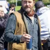 John-Garrity-Greenland-Migration-2025-Gerard-Butler-Brown-Vest